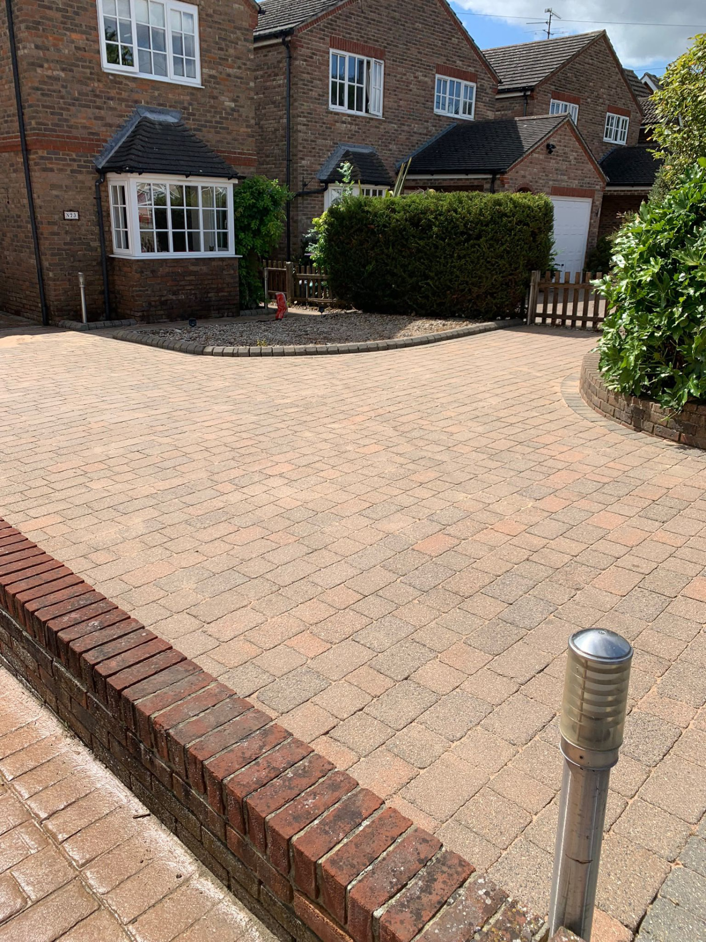 Brick-house driveway after cleaning