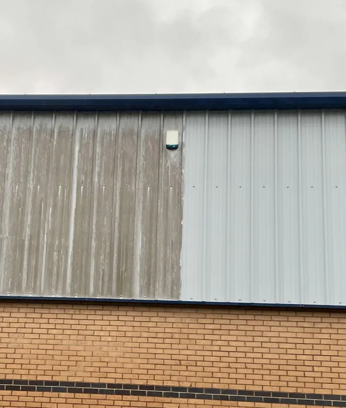 Cladding half cleaned on a real job, showing the difference